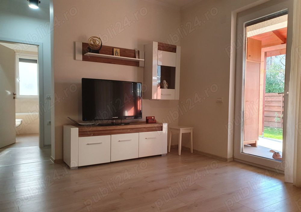 Se închiriază apartament premium 3 camere cu grădină & 2 locuri de parcare – 750